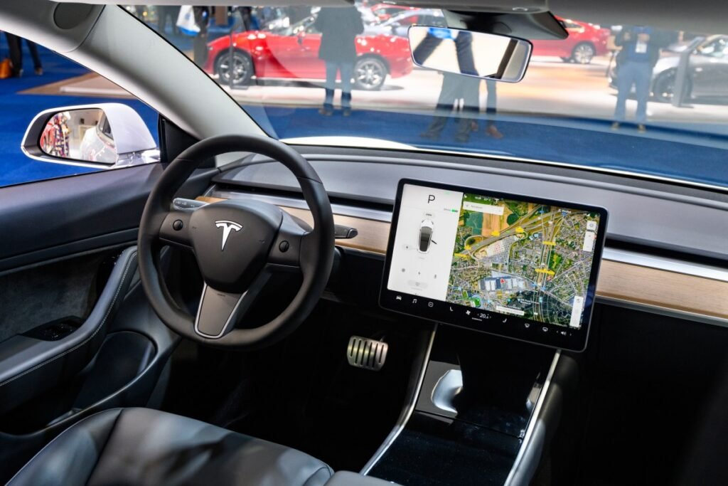 Tesla Announces ‘Conditional’ Settlement in Rivian Trade Secrets Lawsuit